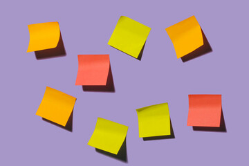 Empty colorful sticky notes on purple background