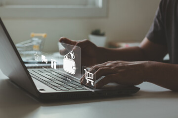Online shopping and Online payment concept. Businessman holding credit card and typing on laptop for online shopping and payment makes a purchase on the Internet, Business financial and technology.