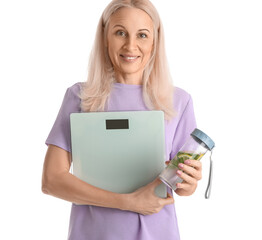 Mature woman with scales on white background