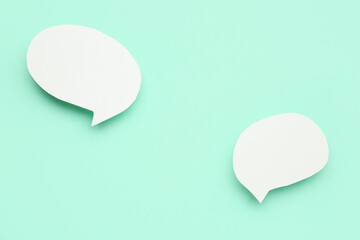 Blank speech bubbles on turquoise background