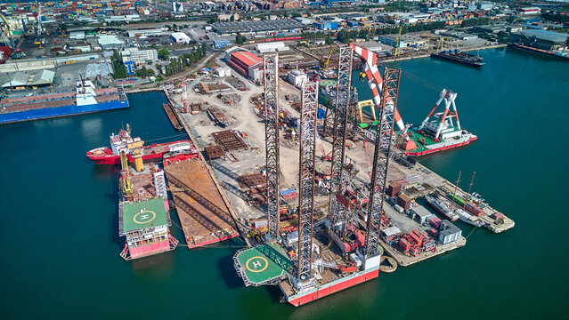 Aerial view of oil platforms anchored in the city harbor for repair
