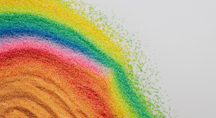 Close-up of rainbow colored sand streaks in vivid colors in high resolution and high sharpness
