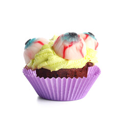 Delicious Halloween cupcake with eyes on white background