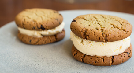 delicious homemade cookie with strawberry ice cream on a plate in high resolution