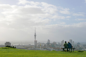 A couple viewing cityscape