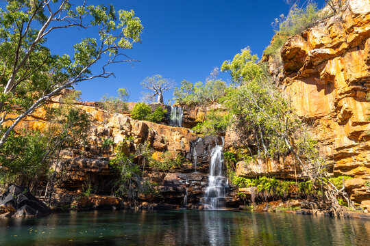 Galvin Gorge waterfall with swimming pond and boab tree, Kimberley region of Western Australia