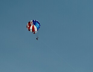 paragliding in the blue sky