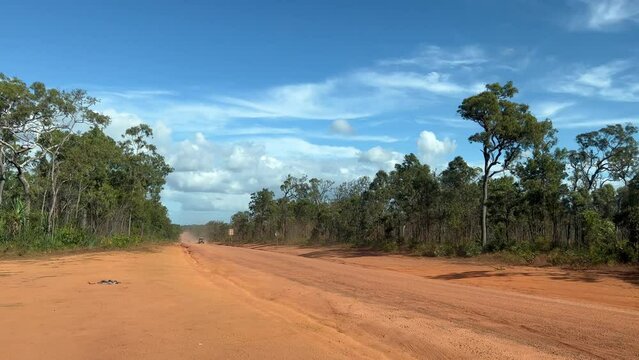 Off road vehicle drive on Peninsula Development Road DPR, the main transport link within Cape York and Australian mainland. 