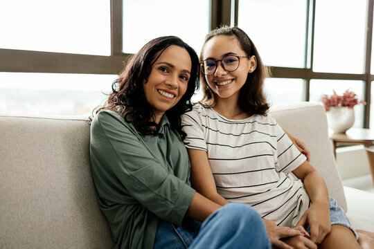 Portrait of a mother and her teenage daughter at home