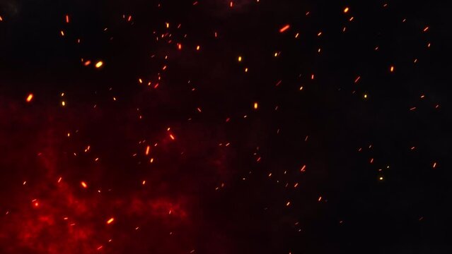Flying embers particle background. Fire particles background. Fire sparks particles background.