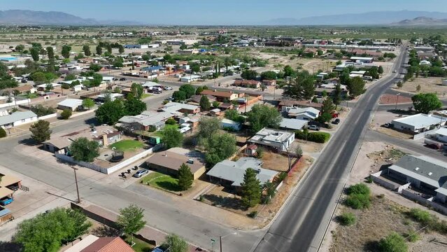 Southwest USA town in desert. Aerial establishing shot of houses and homes in neighborhood.