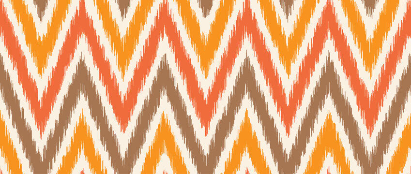 Seamless ikat pattern. Ethnic zigzag chevron repeating background. Ornamental tribal fabric and textile swatch print design. Vector asian folk abstract wallpaper