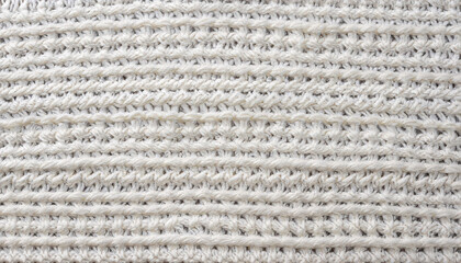 Wool sweater texture of white color with cable knitting stitch pattern. Natural knitted wool white material with ornament. Horizontal or vertical background with handmade knitted fabric texture