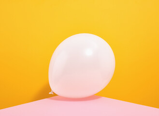 An inflated balloon. Birthday and friendly atmosphere.