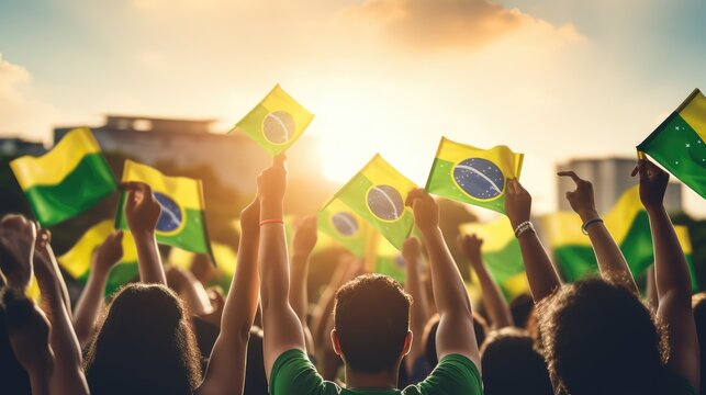 Lifting Brazilian Flags: Back view group of People Holding Brazilian Flags,