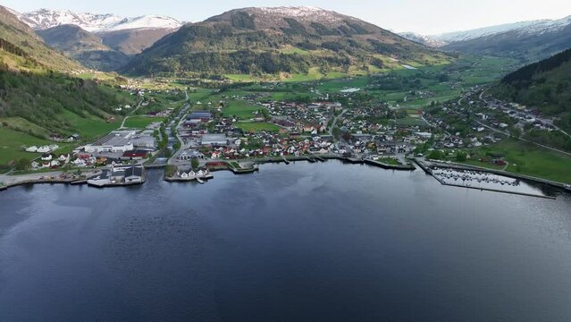 Vikoyri Sogn og Fjordane Norway - Forward moving evening sunset descending aerial
