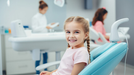 Little girl sitting in the dentists office