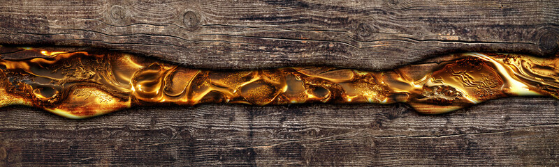 Old cracked brown wood with molten golden epoxy sparkling texture river