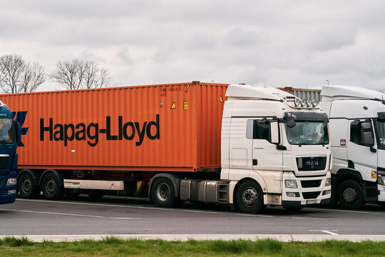 Poland, Europe - June 26, 2023: International Shipping and Delivery: Hapag-Lloyd Container on Truck.