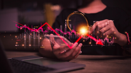 Economic crisis, Women analyzing sales data and economic graph chart that is falling due. the stock market crash caused. Economic crisis concept.