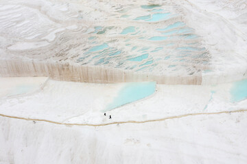 Carbonate travertines the natural pools during sunset, Pamukkale, Turkey