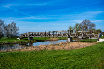 A view of the wooden bridge over the river Unstrut in Schönfeld near Artern