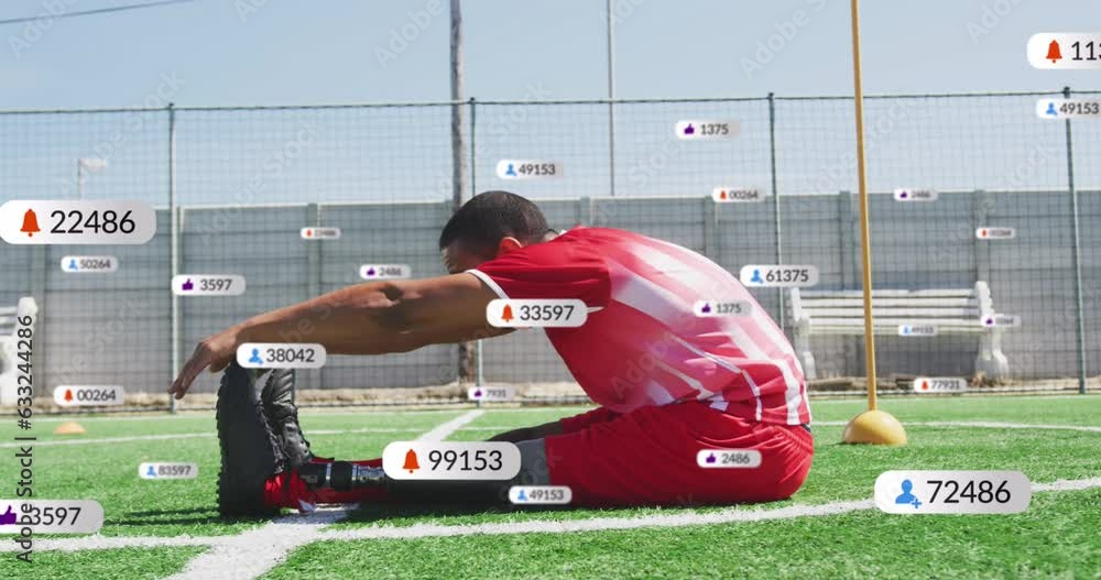 Aufkleber animation of multiple notification bars over biracial soccer player doing stretching on ground