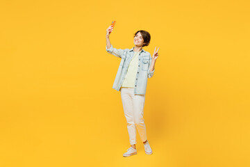 Full body young happy woman she wear green t-shirt denim shirt casual clothes doing selfie shot on...