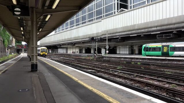 Train arriving at Platform 2 of Victoria Station, central London, UK.