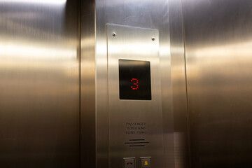 elevator status display The stainless steel leaf indicates where the floor is located.