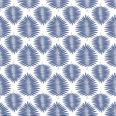 Seamless pattern with cobalt blue fan palm leaves silhouette.