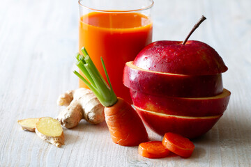 Fresh, healthy juice with carrot, apple and ginger