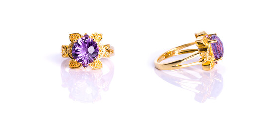 A stunning amethyst ring set in gleaming yellow gold, radiating elegance and luxury.