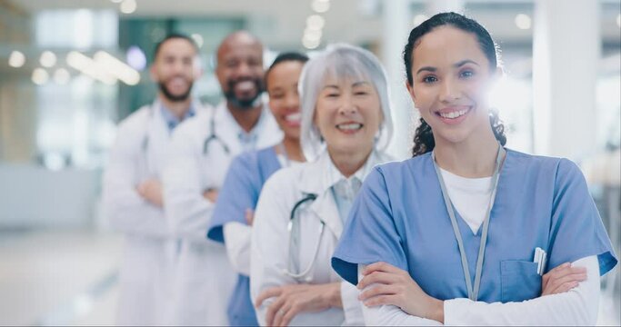 Crossed arms, group and face of doctors in hospital with confidence, leadership and happiness. Smile, diversity and portrait of a professional team of healthcare workers in hallway of medical clinic.