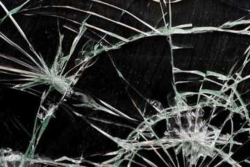 
shattered glass on black background