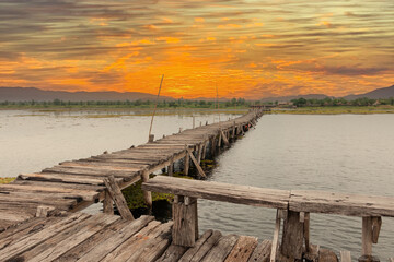 Fototapeta premium old wooden bridge on big lake