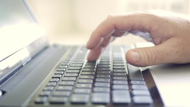 Blurred Shooting with Programmer Introducing Data Online Using Pc Keypad. Man Accessing Internet Network Using Digital Technology.