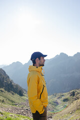 Fototapeta na wymiar Portrait of a young man in the mountain