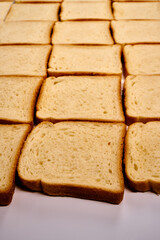 Slices of toast bread on a white background.