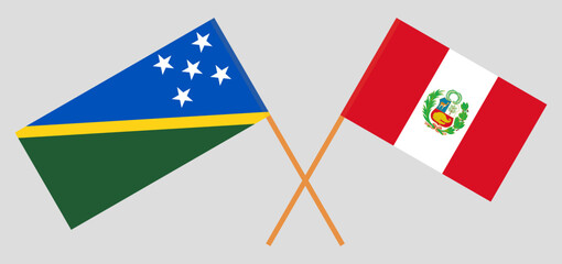 Crossed flags of Solomon Islands and Peru. Official colors. Correct proportion