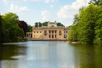 Fototapeta na wymiar The Palace on the Isle (Palac Na Wyspie) also known as Baths Palace (Palac Lazienkowski). This is is a classicist palace situated in Lazienki park (Royal Baths Park) in Warsaw city, Poland