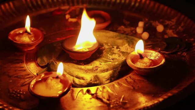 spiritual oil lamp called aarti in india on the occasion of holy ritual at home