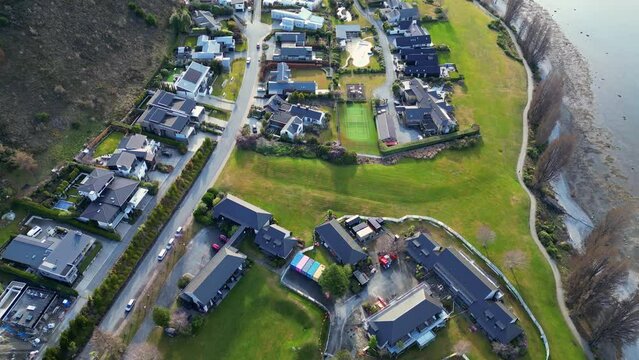 Wanaka, New Zealand: Aerial drone footage of luxury real estate and hotels by lake Wanaka in Otago in New Zealand south island. 