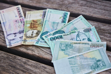 Armenia's money on a wooden surface