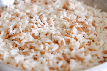 Traditional delicious Turkish rice food; Turkish style rice pilaf (Turkish name; Arpa sehriyeli pirinc pilavi)