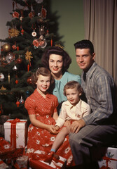 Retro Christmas Photo card of 50s 60s, Vintage Christmas photo with people and retro Christmas decorations of 50s, retro photo of family Christmas 