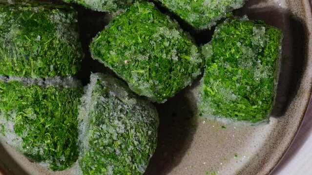 Frozen food spinach cubes homemade. Harvesting concept. Stocking up vegetables for winter storage Healthy food, Cooking ingredients