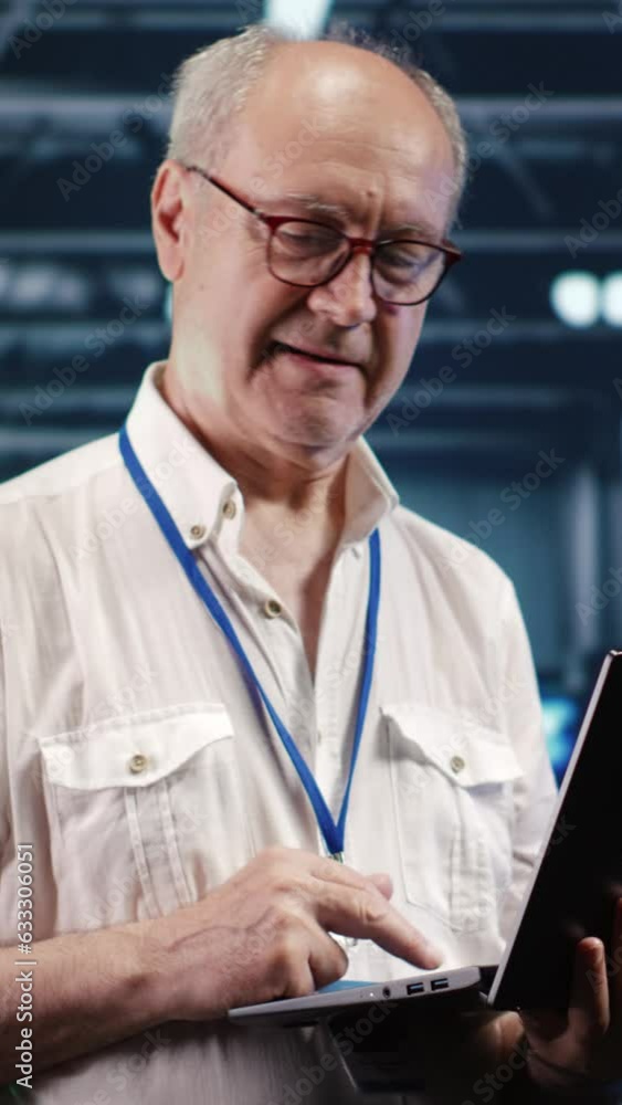 Aufkleber vertical video trained it professional navigating network of servers in industrial place. manager wi