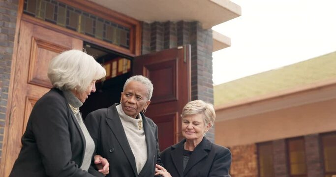 Funeral, church and senior women walking helping for empathy, comforting and support. Depression, death and sad elderly friends with care for mourning, grief and sorrow by chapel in memorial ceremony