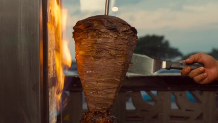 Sirloin trompo de carne for tacos taco flame fire grilled grill hot spinning raw authentic healthy mexican latin cantina restaurant party fiesta